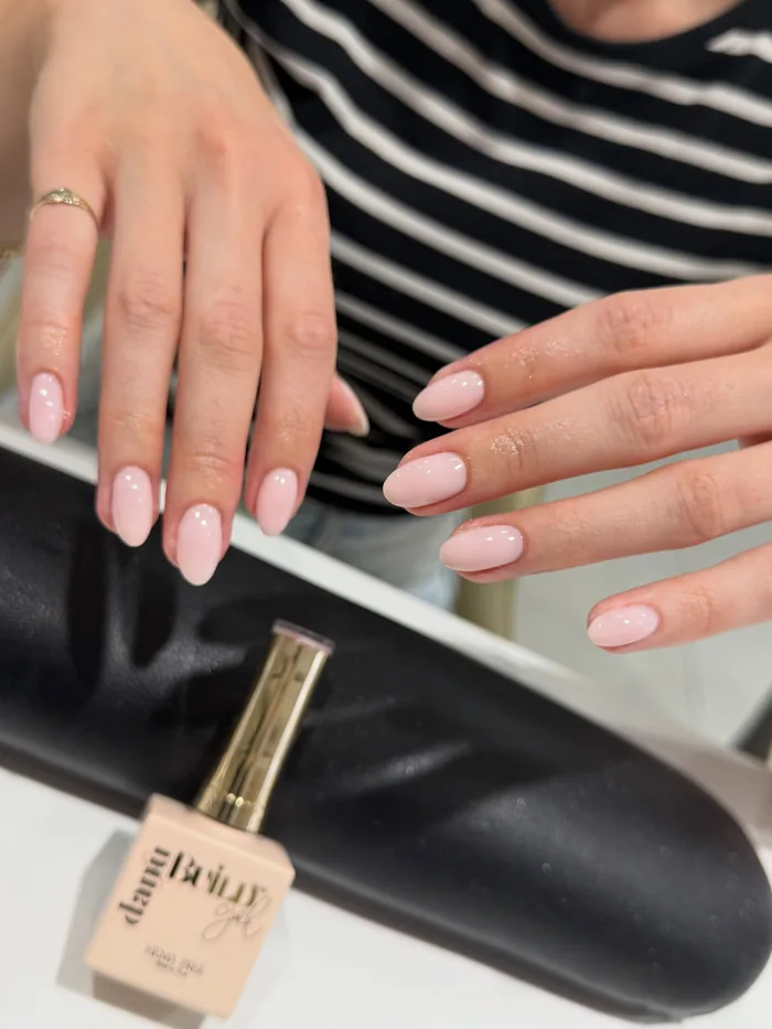 A soft nude BIAB set finished at L1 Nails